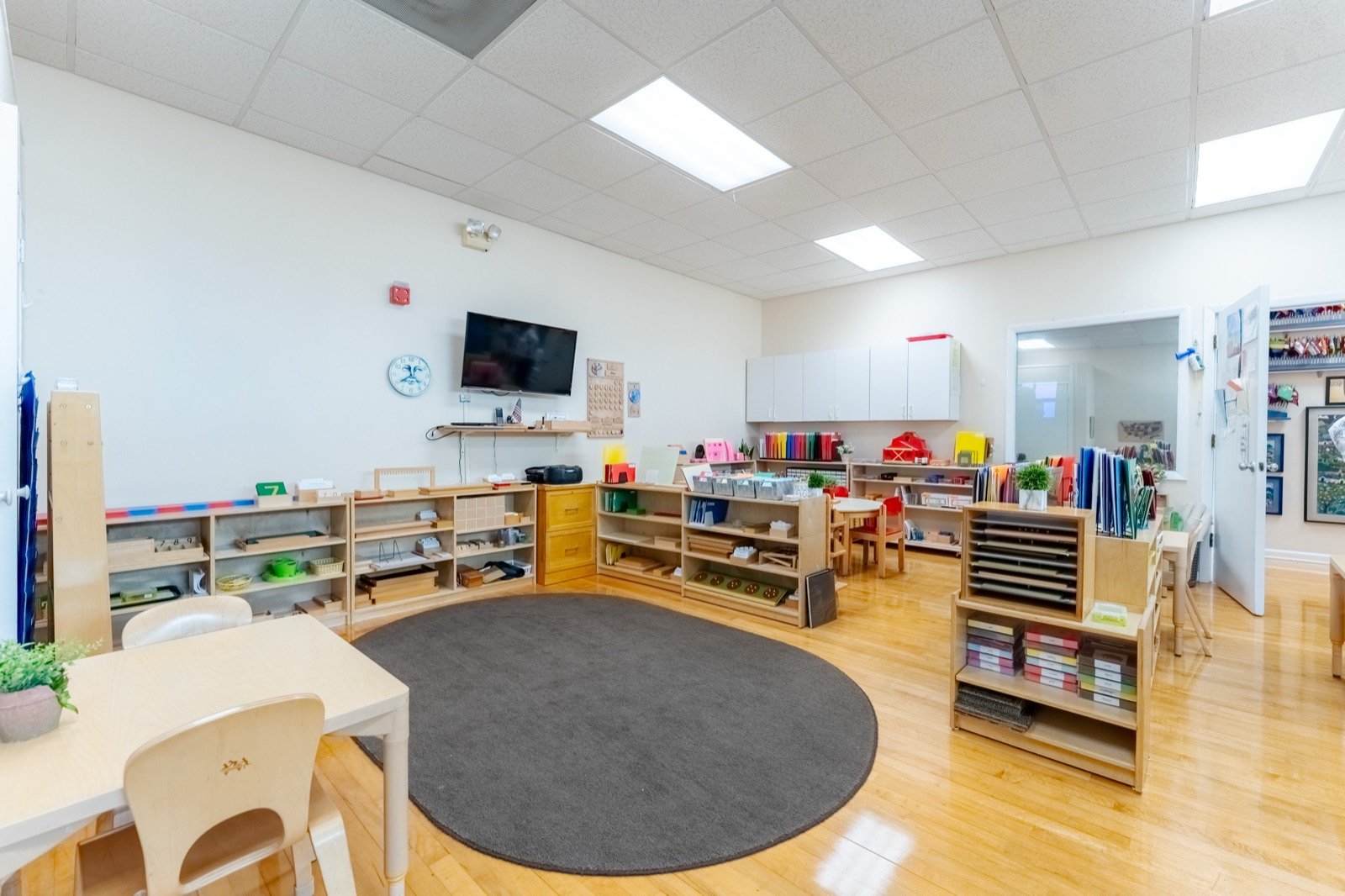Montessori materials on open shelves