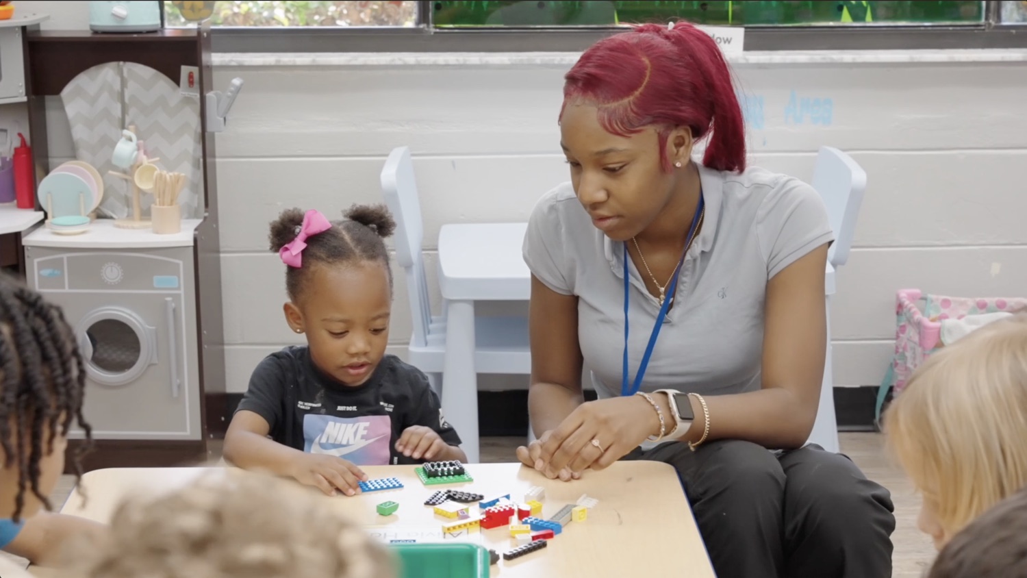 Teacher working with a student
