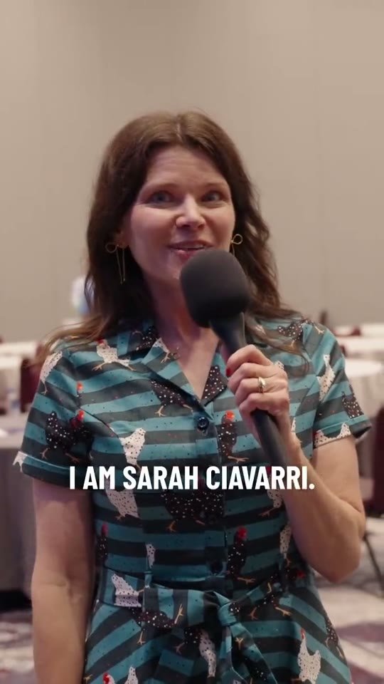 Sarah Ciavarri speaking to camera at the conference